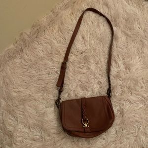 Dark brown crossbody leather bag.